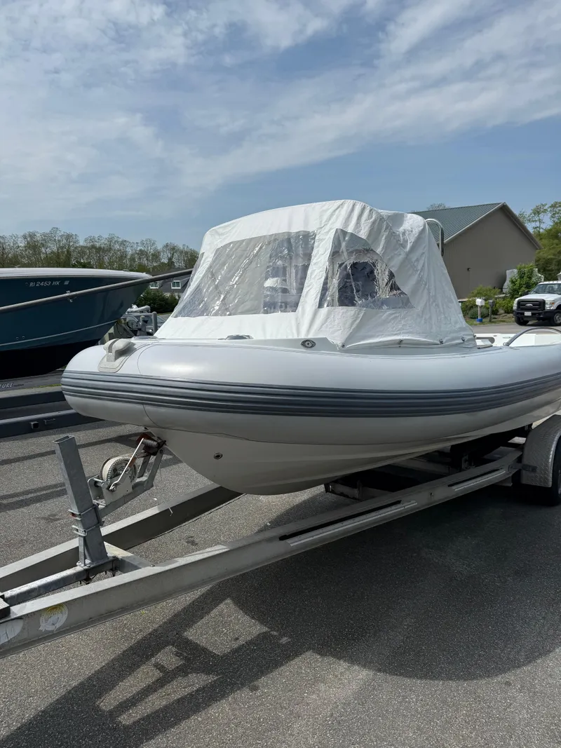 Slide: The Image of 2015 Castoldi 21 Diesel Jet Tender on trailer, covered, outdoors. - 25