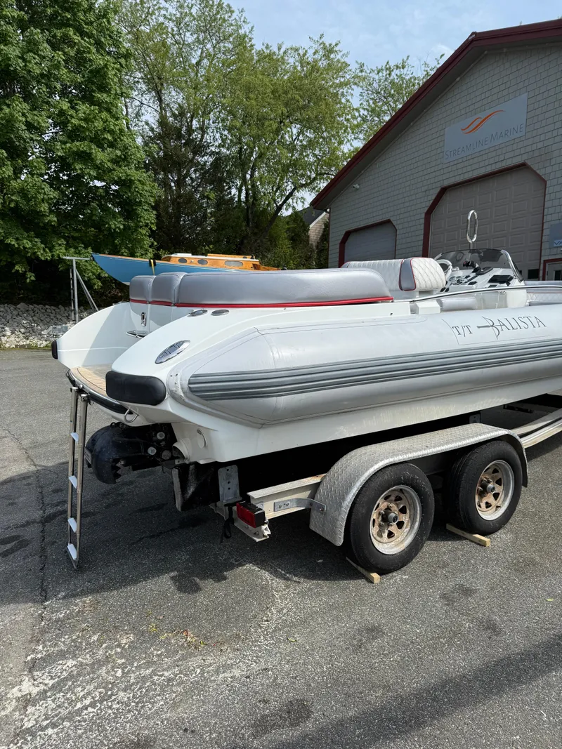 Slide: The Image of 2015 Castoldi 21 Diesel Jet Tender on trailer, parked outdoors near a building. - 27