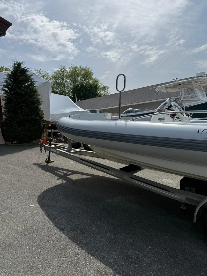 Slide: The Image of 2015 Castoldi 21 Diesel Jet Tender on trailer, parked outdoors under cloudy sky. - 29