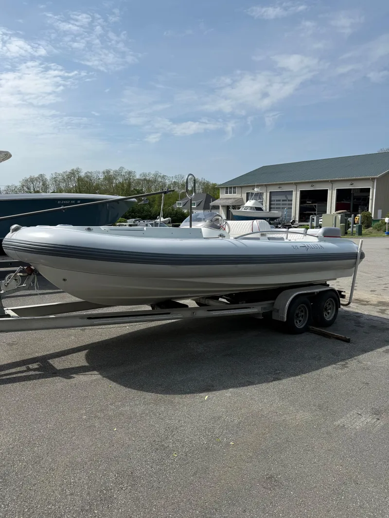 Slide: The Image of 2015 Castoldi 21 Diesel Jet Tender on trailer, parked outdoors under clear sky. - 30