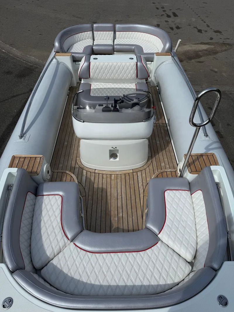 Slide: The Image of 2015 Castoldi 21 Diesel Jet Tender with elegant seating and teak flooring. - 5