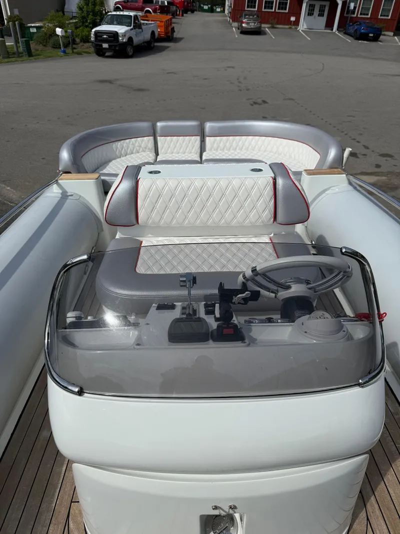 Slide: The Image of 2015 Castoldi 21 Diesel Jet Tender with sleek seating and modern controls. - 6