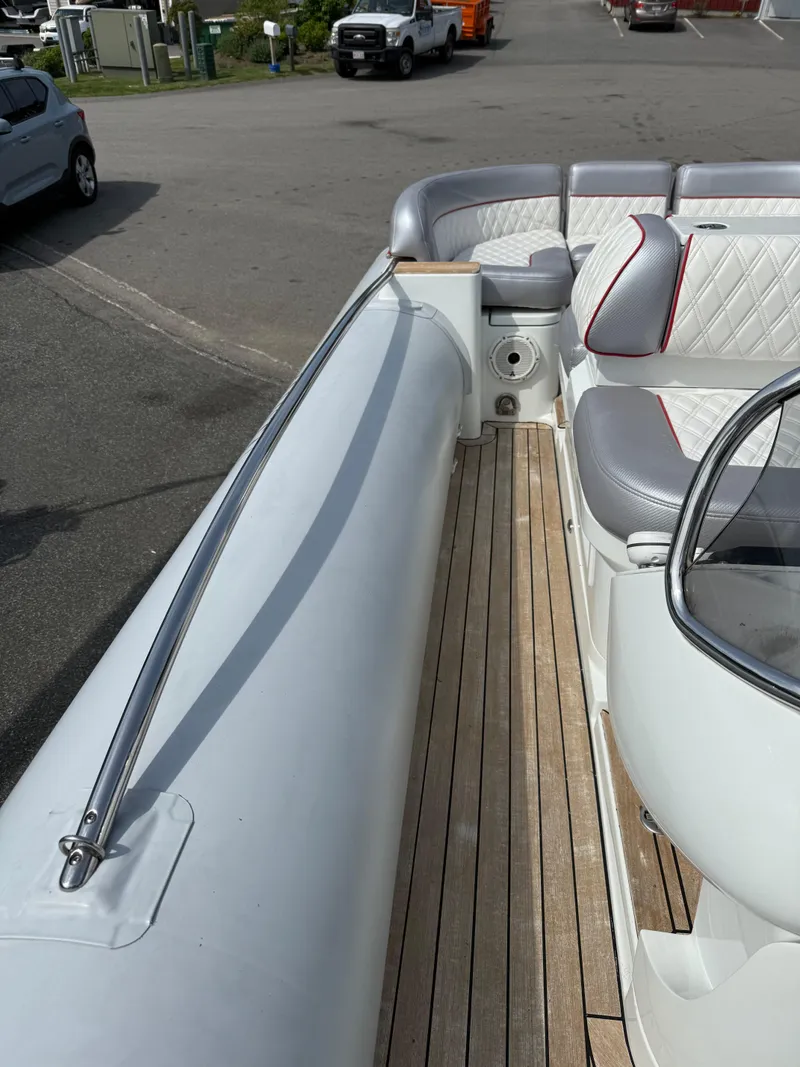 Slide: The Image of 2015 Castoldi 21 Diesel Jet Tender with sleek seating and wooden deck. - 7