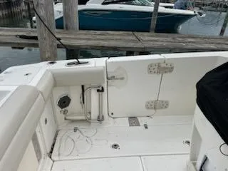 Slide: The Image of Boston Whaler 280 Outrage 2022 boat interior, featuring deck and seating area. - 17