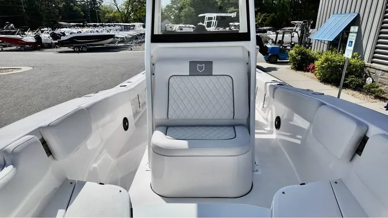 Slide: The Image of 2025 Sea Fox 248 Commander boat interior with white seating and modern design. - 19