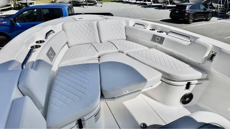 Slide: The Image of 2025 Sea Fox 248 Commander boat with spacious, cushioned seating area. - 8