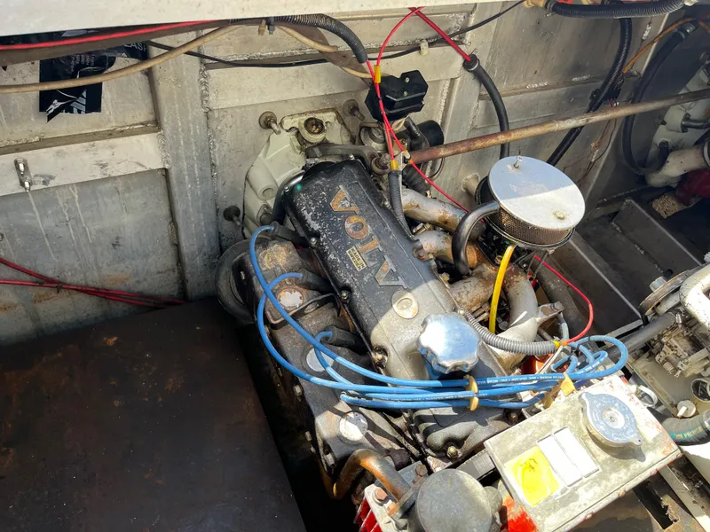 Slide: The Image of Engine compartment of a 1987 Sumerset Custom boat with Volvo components. - 37