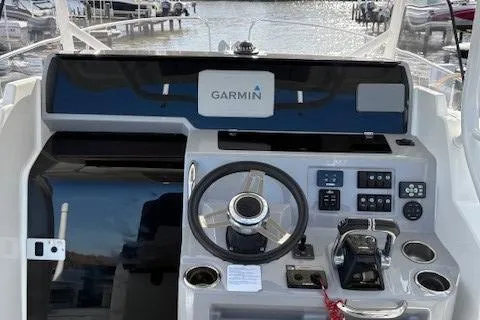 Slide: The Image of Cockpit of 2020 Jeanneau Leader 9.0 CC with Garmin navigation system. - 26