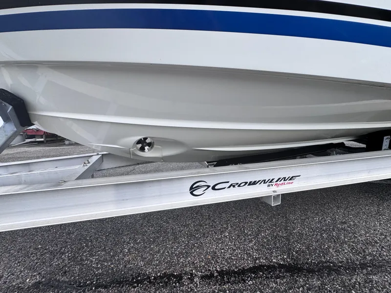Slide: The Image of 2020 Jeanneau Leader 9.0 CC boat on Crownline trailer, close-up view. - 7