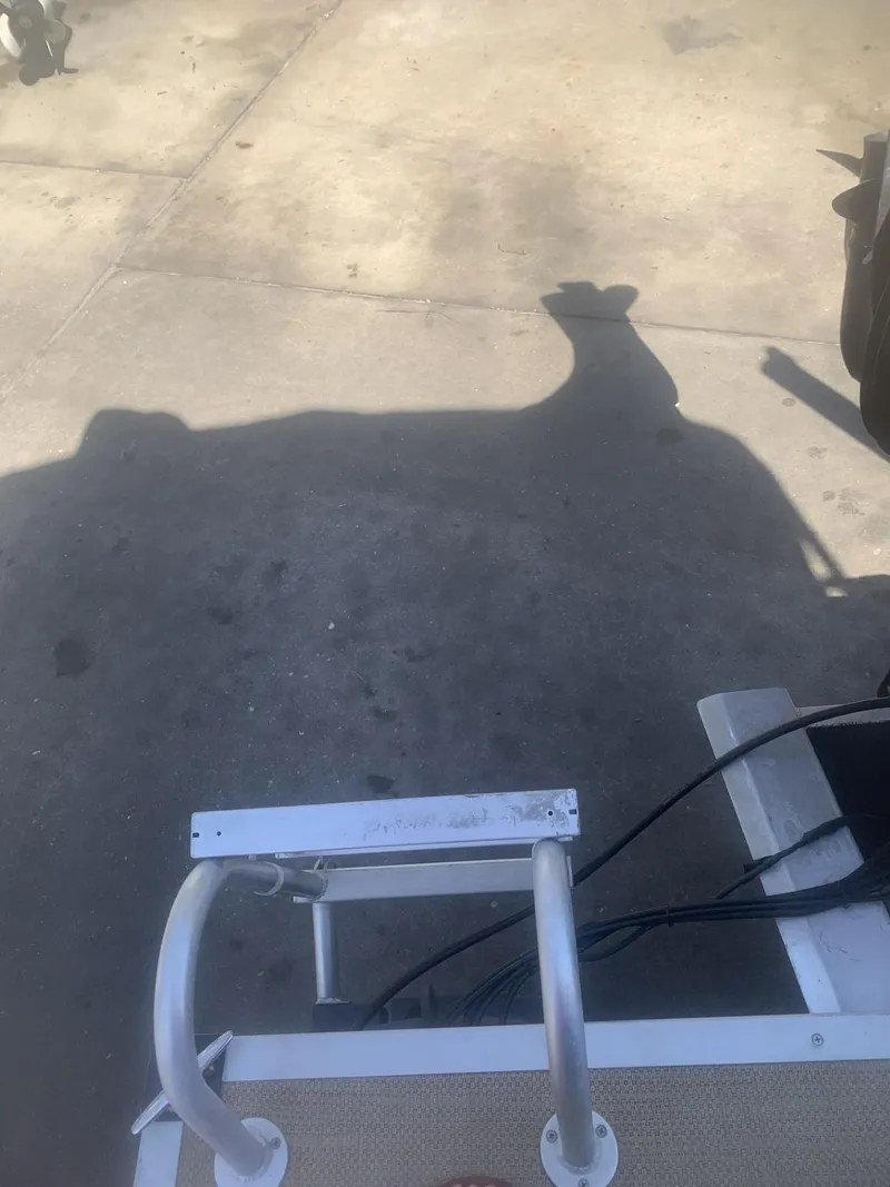 Slide: The Image of Shadow of a Lexington LML 2017 vehicle on a concrete surface. - 11