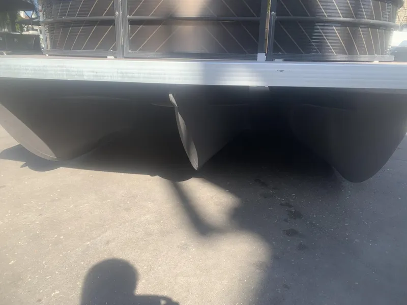 Slide: The Image of 2017 Lexington LML pontoon boat underside view with visible pontoons. - 14