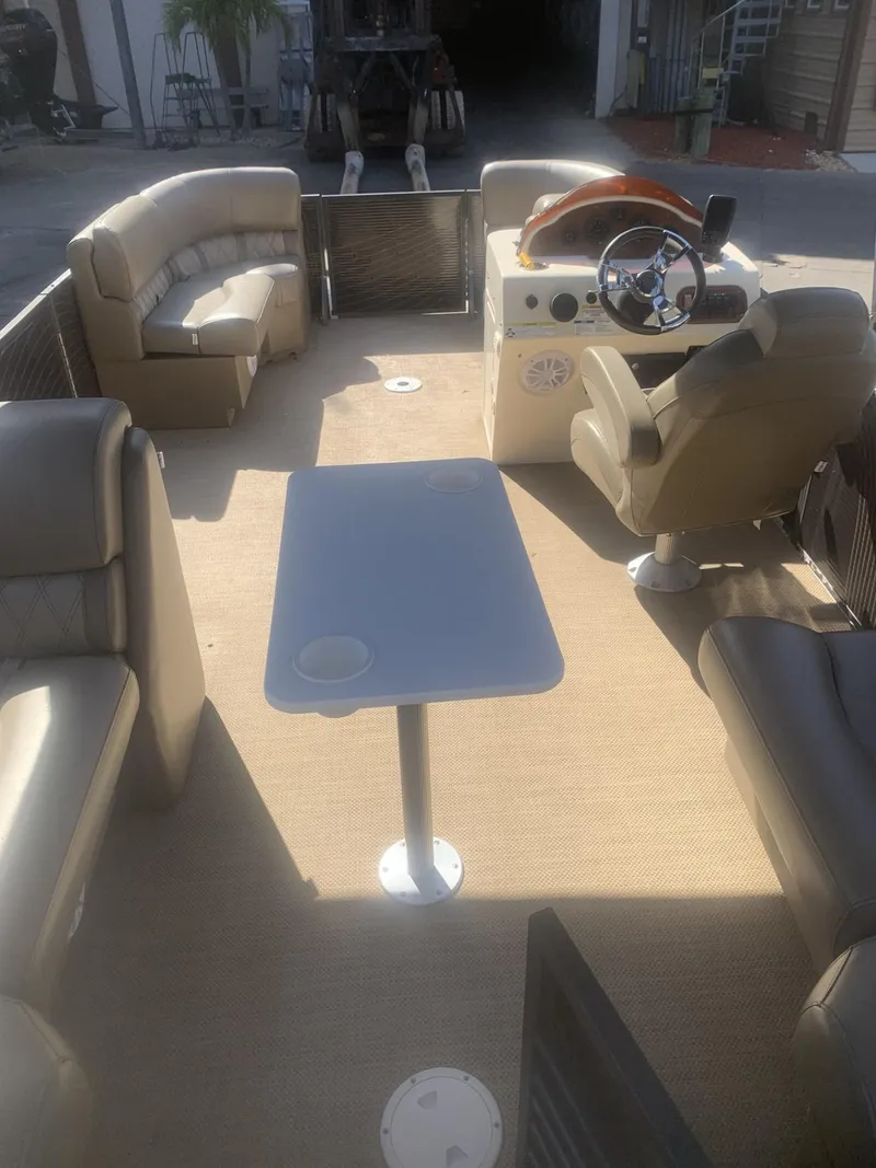 Slide: The Image of 2017 Lexington LML boat interior with seating and steering console. - 9