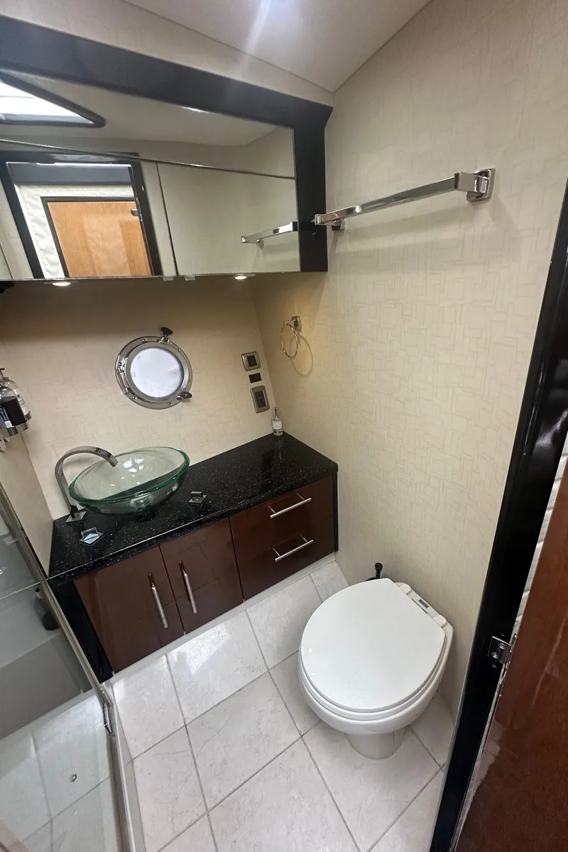 Slide: The Image of Luxurious bathroom in 2008 Marquis 40 SC yacht with modern fixtures and elegant design. - 10