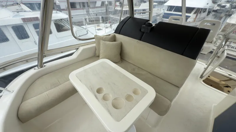 Slide: The Image of Luxurious seating area on 2011 Riviera 43 IPS Open Flybridge yacht. - 10