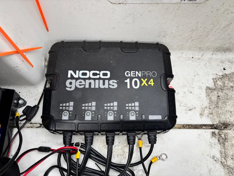 Slide: The Image of NOCO Genius GENPRO 10X4 battery charger in a 2017 Nitro Z18 boat. - 13