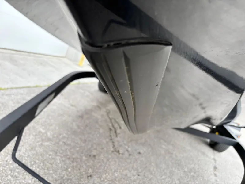 Slide: The Image of Bottom view of a 2017 Nitro Z18 boat hull on a trailer. - 2