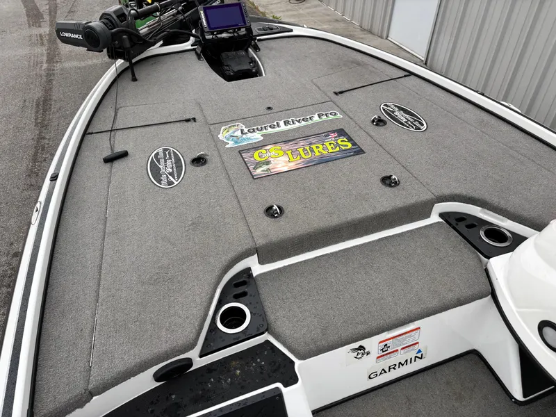 Slide: The Image of 2017 Nitro Z18 boat deck with Garmin equipment and fishing gear. - 5