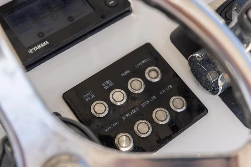 Slide: The Image of Control panel of a 2018 Jupiter 26 FS boat with Yamaha display. - 32