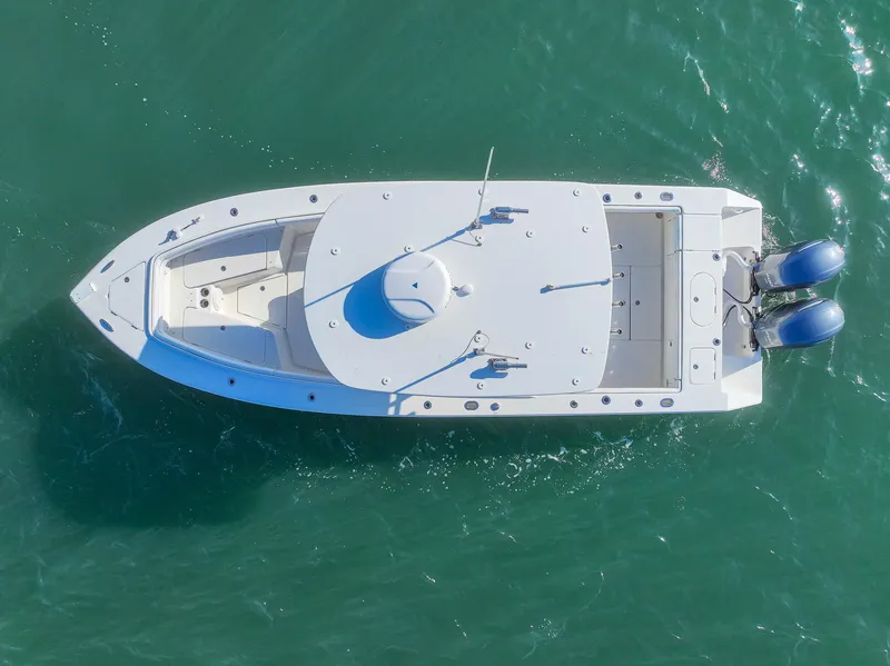 Slide: The Image of Aerial view of 2018 Jupiter 26 FS boat on turquoise water. - 6