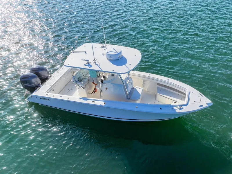 Slide: The Image of 2018 Jupiter 26 FS boat on clear blue water, aerial view. - 7