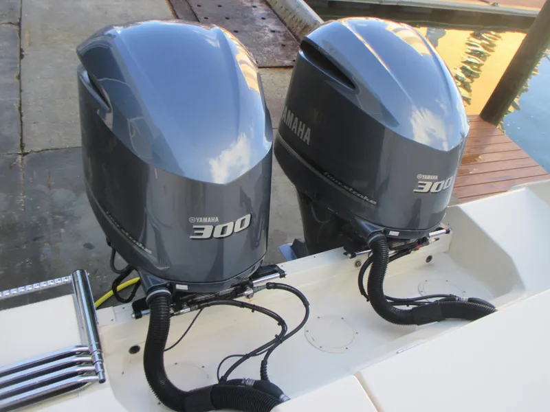 Slide: The Image of Twin Yamaha 300 outboard engines on a 2018 Grady-White Freedom 307 boat. - 12