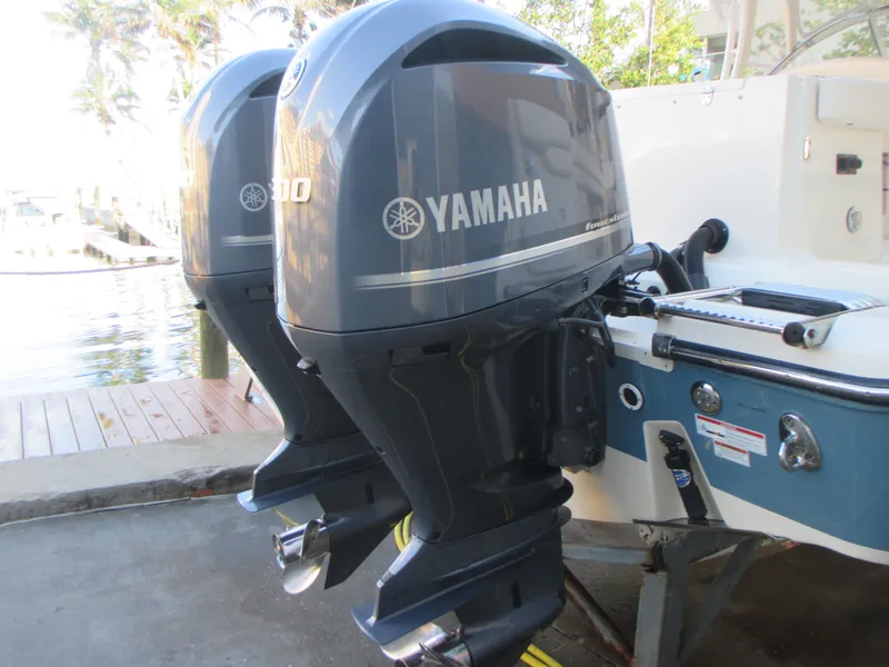 Slide: The Image of Twin Yamaha outboard engines on a 2018 Grady-White Freedom 307 boat. - 9