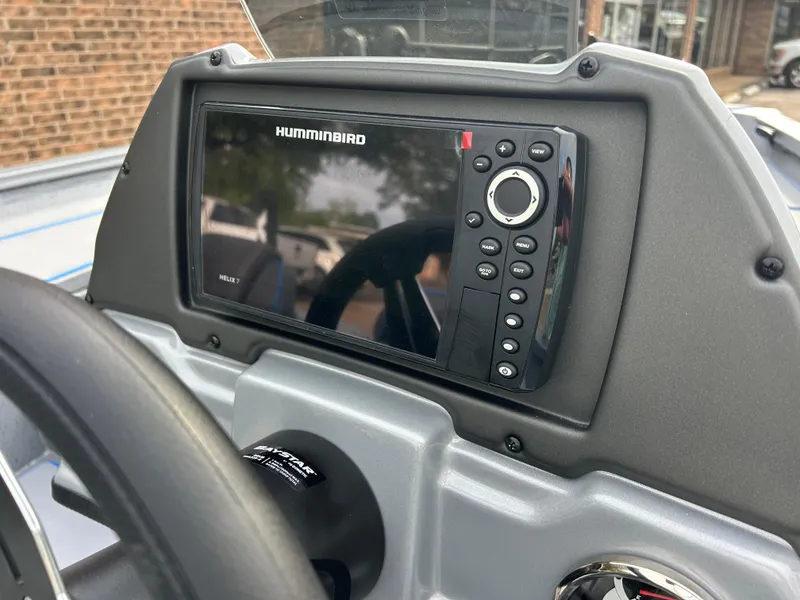 Slide: The Image of 2025 Xpress H18 boat dashboard featuring a Humminbird fish finder display. - 5