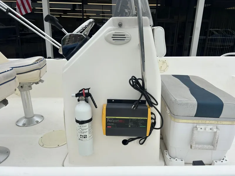 Slide: The Image of 2001 Sea Fox 172 CC boat interior with fire extinguisher and equipment. - 16