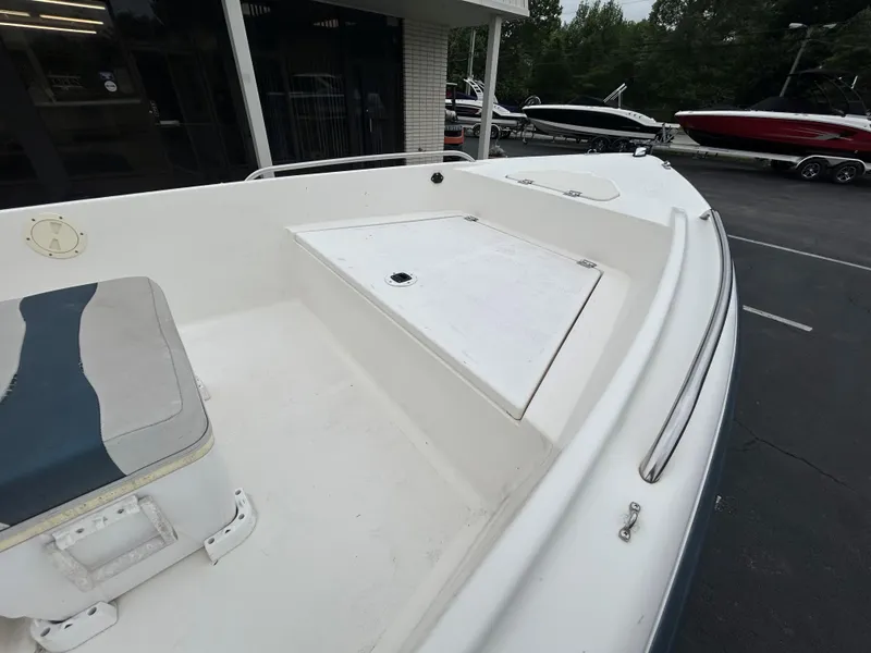 Slide: The Image of 2001 Sea Fox 172 CC 90 HP boat deck with seating and storage. - 17