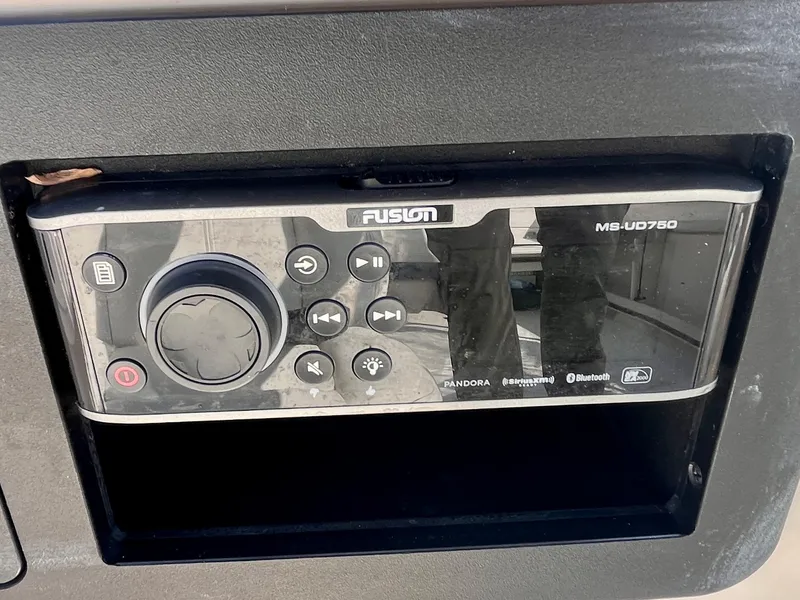 Slide: The Image of Fusion MS-UD750 marine stereo system on 2017 Grady-White Freedom 192 boat dashboard. - 10