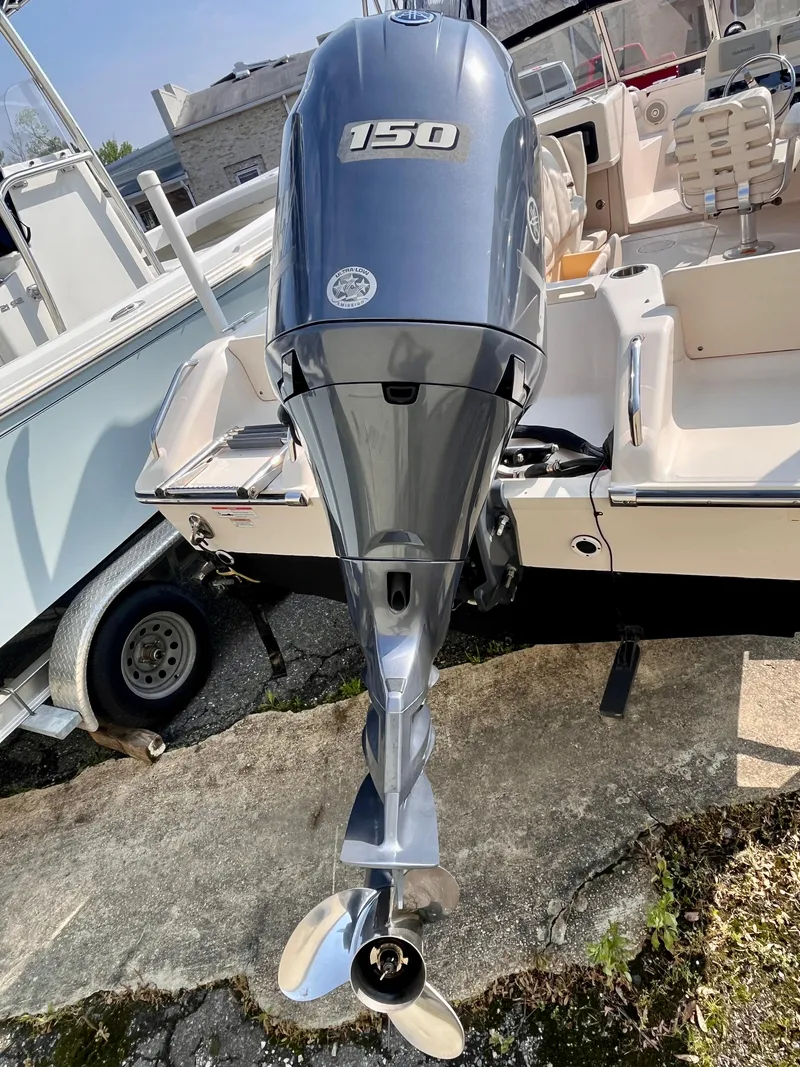 Slide: The Image of 2017 Grady-White Freedom 192 boat with a 150 HP outboard motor. - 6