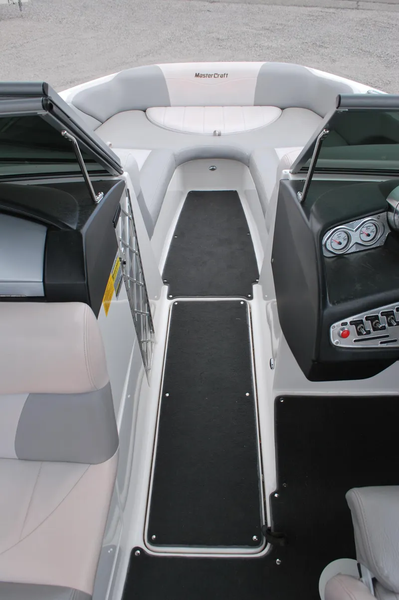 Slide: The Image of 2007 MasterCraft X45 boat interior with seating and dashboard view. - 9