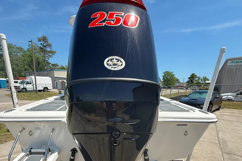 Slide: The Image of 2021 Sea Pro 248 Bay boat with a 250 horsepower engine, parked outdoors. - 3