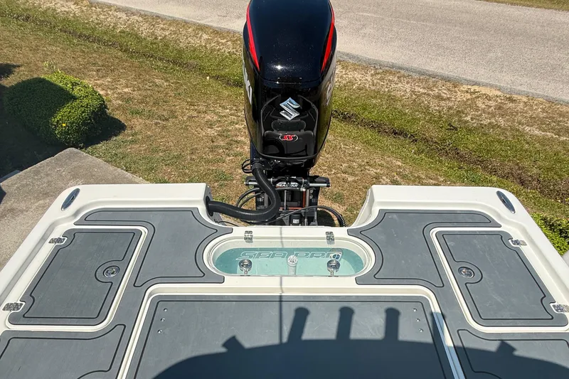 Slide: The Image of 2021 Sea Pro 248 Bay boat with Suzuki outboard motor, viewed from the deck. - 9