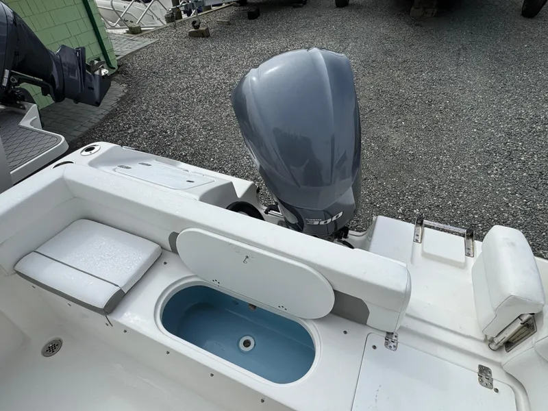 Slide: The Image of Tidewater 230 LXF 2016 boat with outboard motor and livewell on deck. - 4