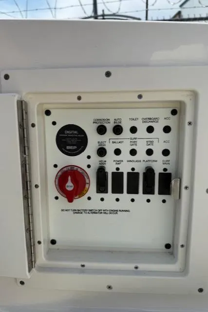 Slide: The Image of Control panel of 2023 Chaparral 267 SSX boat with switches and digital display. - 27