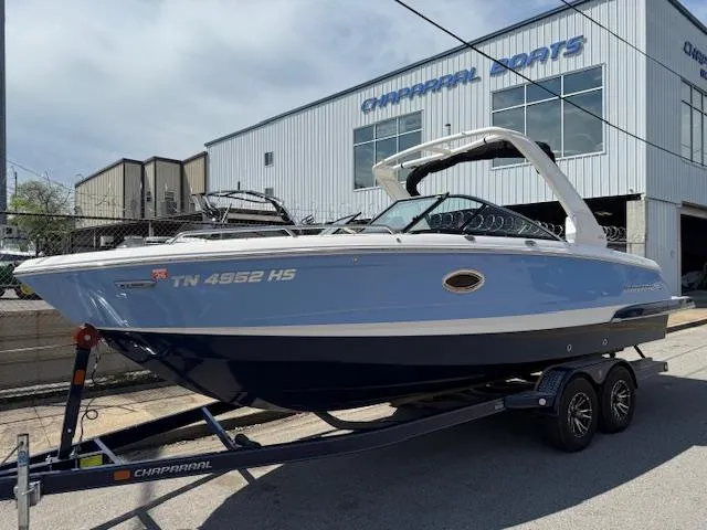 Slide: The Image of 2023 Chaparral 267 SSX boat on trailer outside Chaparral dealership. - 3