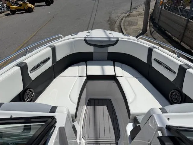 Slide: The Image of 2023 Chaparral 267 SSX boat interior with sleek seating and modern design. - 8