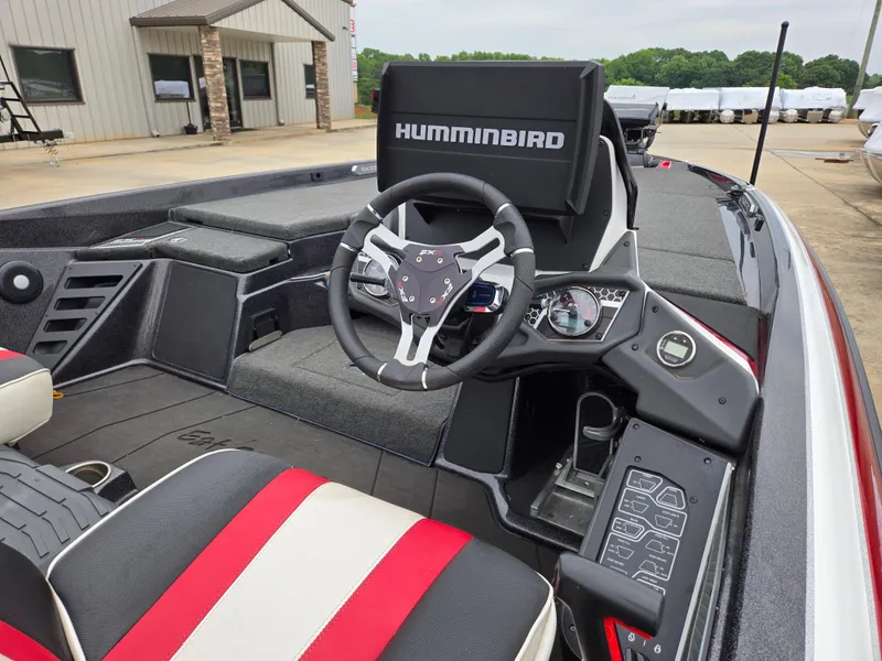 Slide: The Image of 2022 Skeeter FXR 20 Limited boat interior with steering wheel and Humminbird display. - 5
