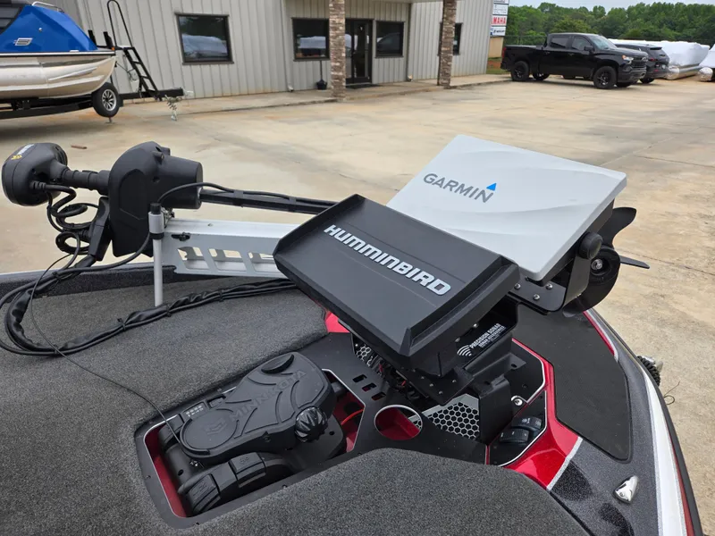 Slide: The Image of 2022 Skeeter FXR 20 Limited boat with Garmin and Humminbird electronics on deck. - 7