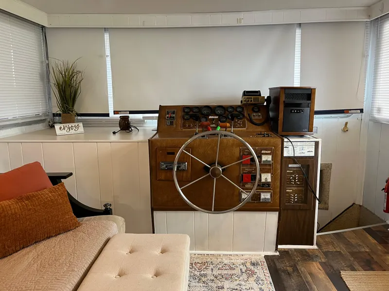 Slide: The Image of Cozy boat interior with vintage Gibson 1988 control panel and comfortable seating area. - 14
