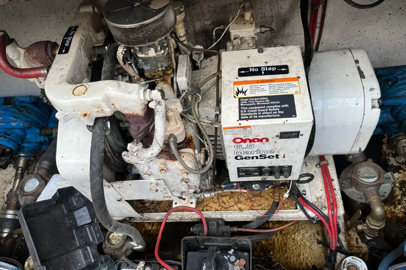 Slide: The Image of 1988 Gibson Standard engine with Onan Marine GenSet, showing mechanical components and wiring. - 45