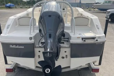 Slide: The Image of 2017 Robalo R200 Center Console boat with outboard motor, parked on a trailer. - 8