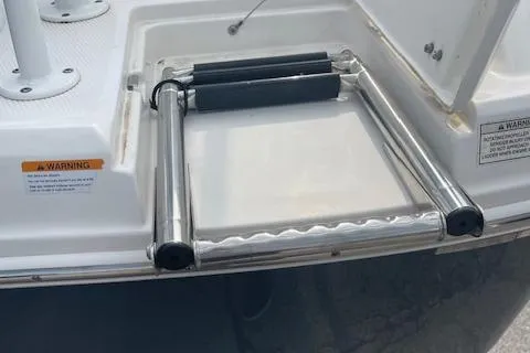 Slide: The Image of Stainless steel swim ladder on 2017 Robalo R200 Center Console boat. - 9