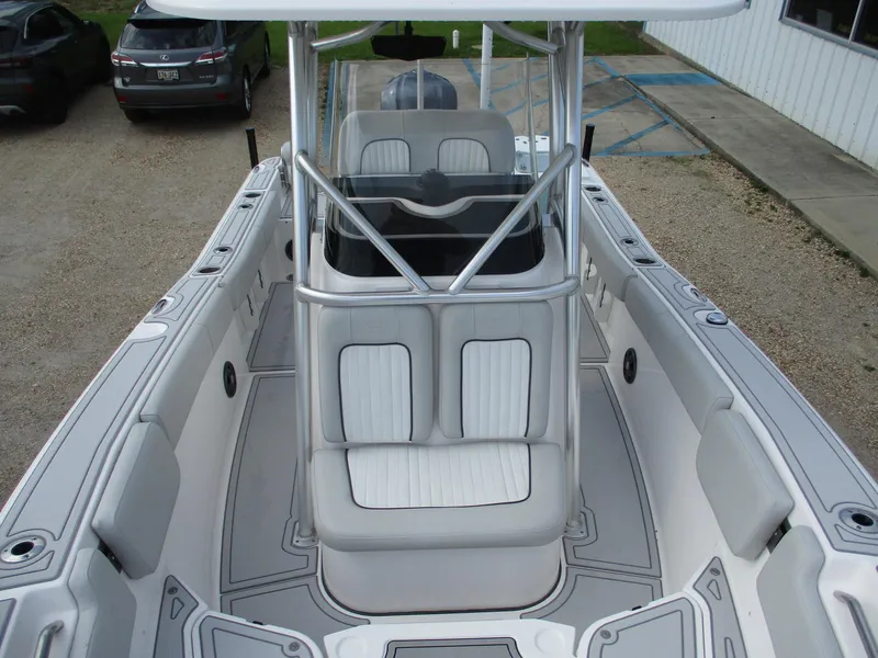 Slide: The Image of 2022 Sea Fox 228 Commander boat interior with seating and console, showcasing modern design. - 14