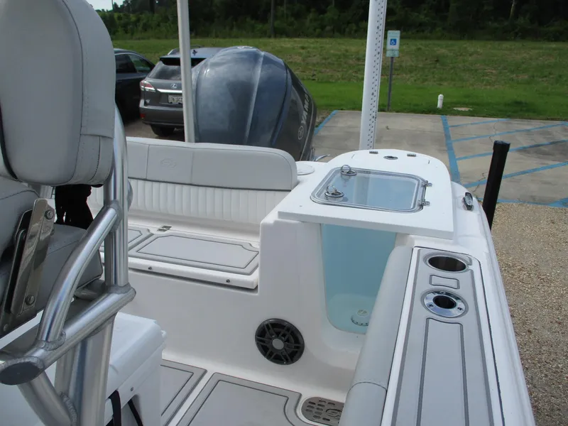 Slide: The Image of 2022 Sea Fox 228 Commander boat interior with seating and storage compartments. - 18
