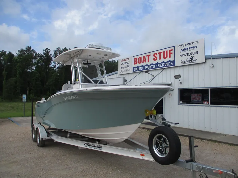 Slide: The Image of 2022 Sea Fox 228 Commander boat on trailer outside dealership. - 2