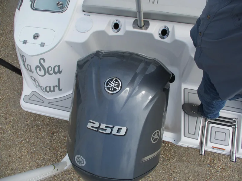 Slide: The Image of 2022 Sea Fox 228 Commander boat with Yamaha 250 engine, rear view. - 6