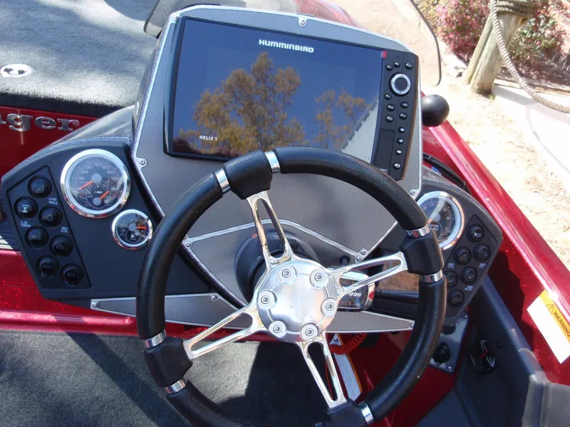 Slide: The Image of 2017 Ranger Z518 Comanche boat dashboard with Humminbird fishfinder and steering wheel. - 11