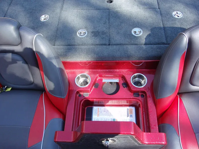 Slide: The Image of 2017 Ranger Z518 Comanche boat interior with red console and cup holders. - 14
